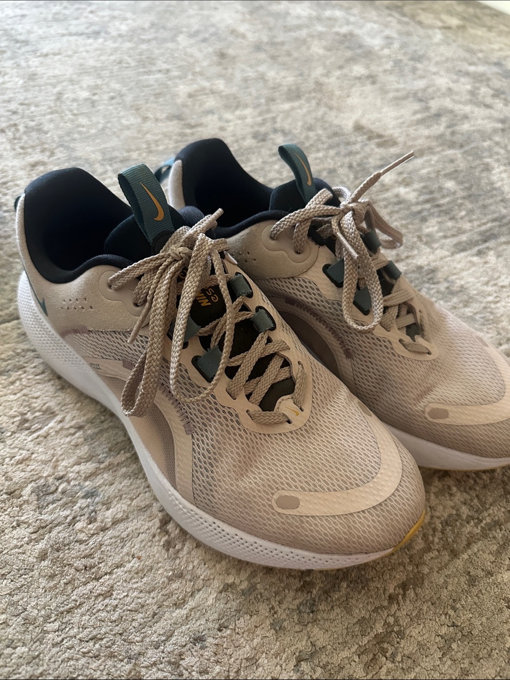 Nike Tan Running Shoes with Teal and Yellow Accents
